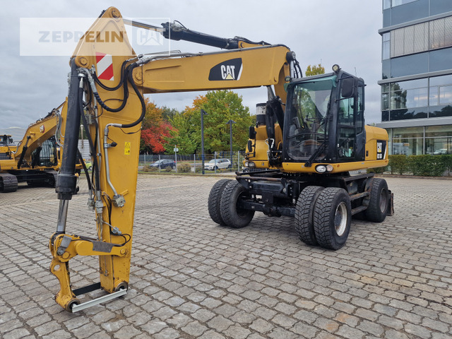 Cat M318D - Багер на тркала: слика 1 Cat M318D - Багер на тркала: слика 1