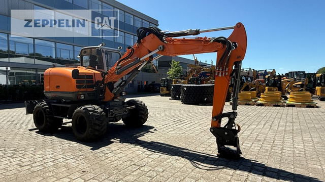 Wacker EW100 - Багер на тркала: слика 1 Wacker EW100 - Багер на тркала: слика 1