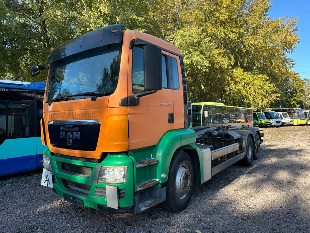 MAN TGS 26.400 6X2-2 BL Meille RK 20.70 Absetzkipper MAN TGS 26.400 6X2-2 BL Meille RK 20.70 Absetzkipper - Камион за подигање контејнери: слика 1 MAN TGS 26.400 6X2-2 BL Meille RK 20.70 Absetzkipper MAN TGS 26.400 6X2-2 BL Meille RK 20.70 Absetzkipper - Камион за подигање контејнери: слика 1